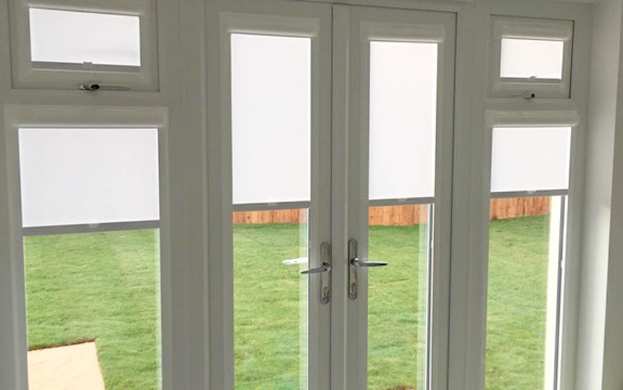 Perfect Fit Blinds, Bathgate, West Lothian. A stylish set of patio doors and windows with perfect fit blinds.